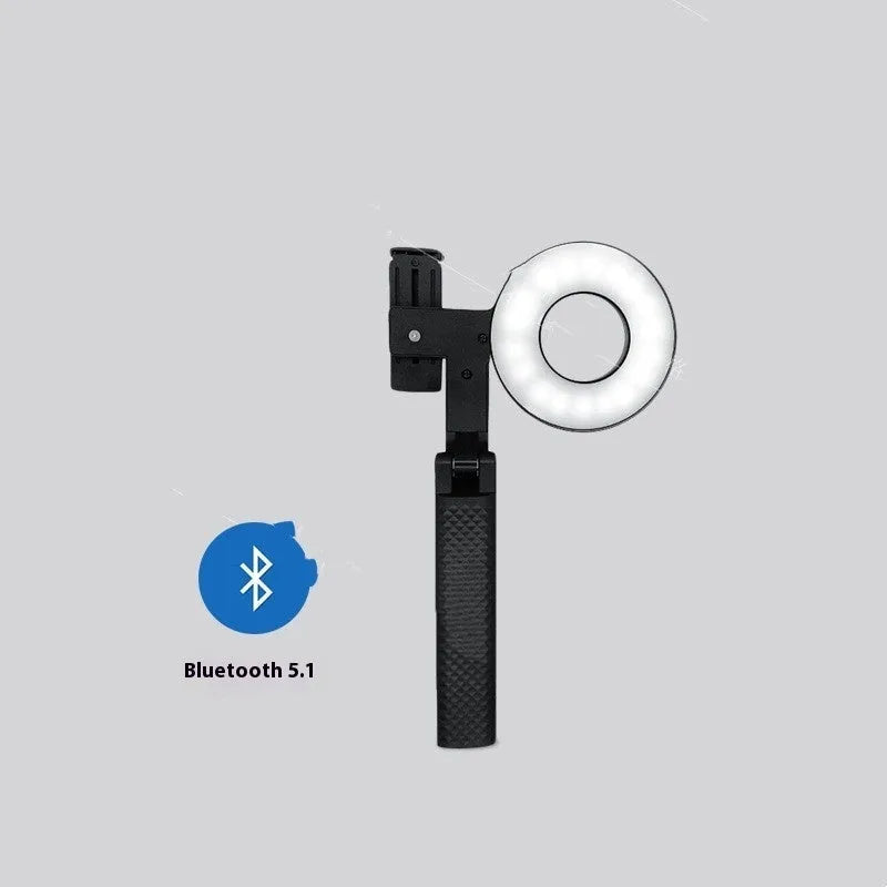 Black handheld LED fill light for phone photography measuring 14.5 x 25.8 x 4.7 cm