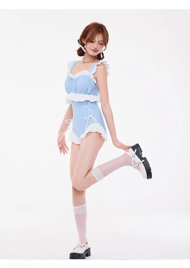Light blue women's one-piece swimsuit with lace chest gather, high waist, and backless design.