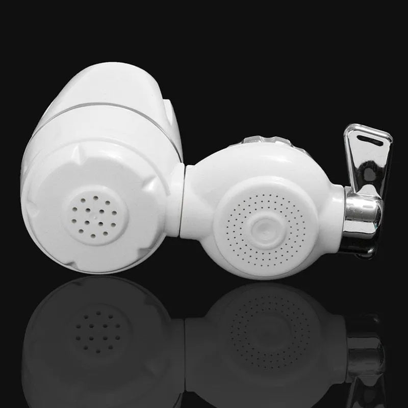 White plastic faucet water purifier with ceramic filter cartridge mounted on kitchen tap
