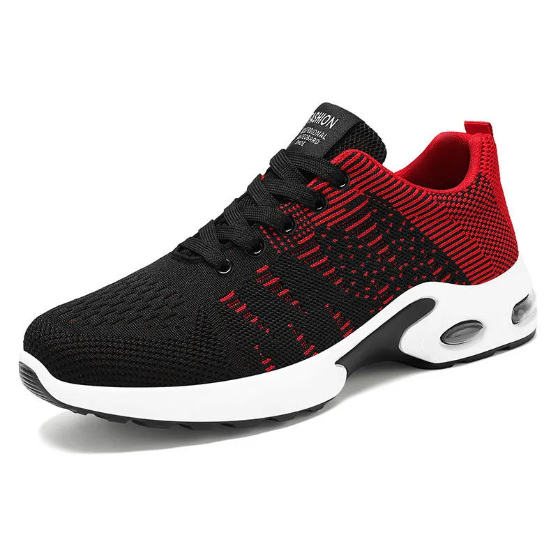 Men's black and grey Flyknit mesh low-top casual sneakers with lace-up front and soft sole.