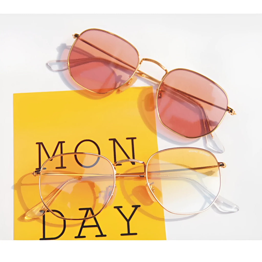 Retro street sunglasses with gold metal frame and transparent red resin lenses