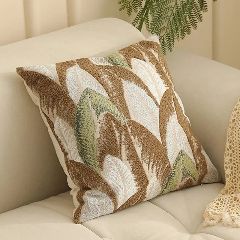 45cm square jacquard cushion cover with detailed floral pattern in retro Nordic style, shown in one of eight available colours.