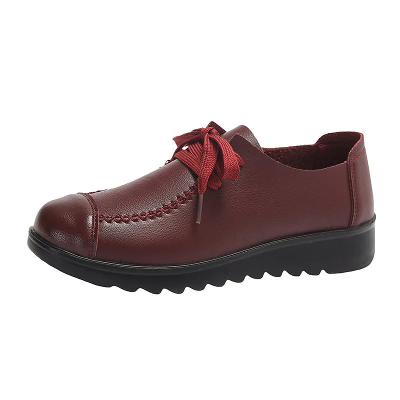 Women's black flat work shoes with microfiber upper, round toe, front lacing and anti-slip polyurethane sole