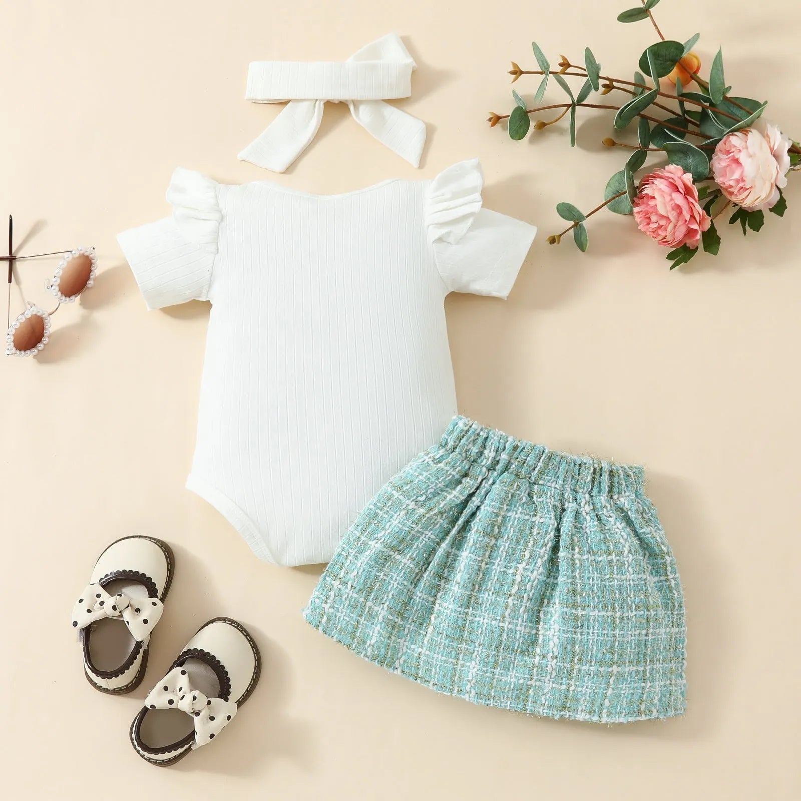 Babies' short-sleeved blouse skirt suit in black with plaid pattern, including romper, skirt and hairband