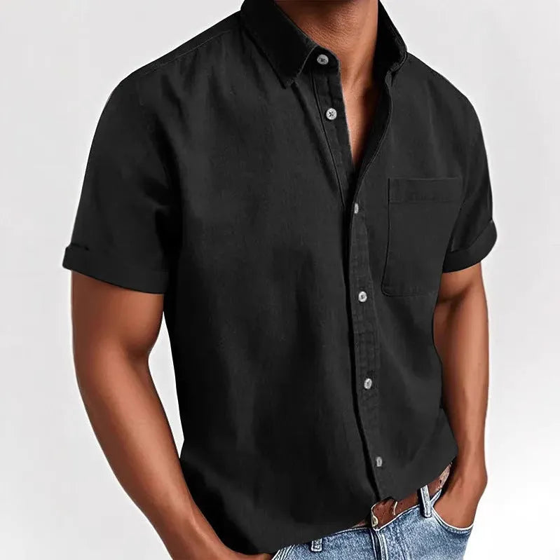 Men's solid colour short-sleeved polo shirt with a classic collar and a single chest pocket.