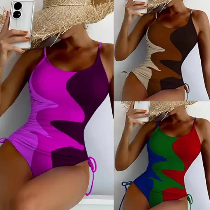 Women's blue one-piece swimsuit with sleeveless backless design and printed stripe pattern