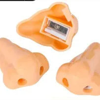 Flesh colour plastic manual pencil sharpener with big nostril and geometry shape.