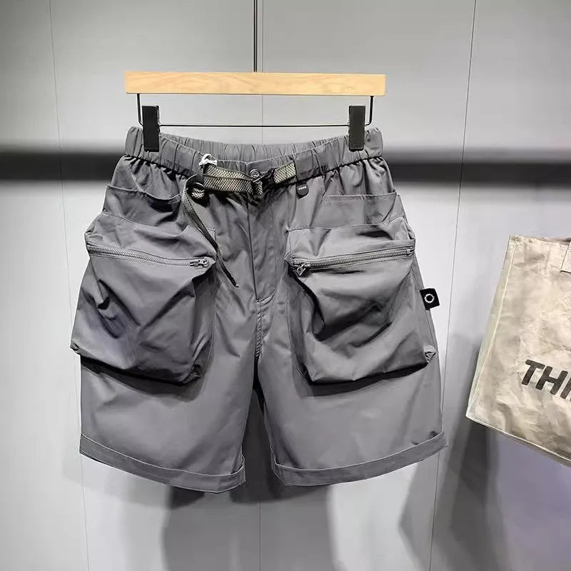 Men's large size work shorts in black with elastic waist and pockets