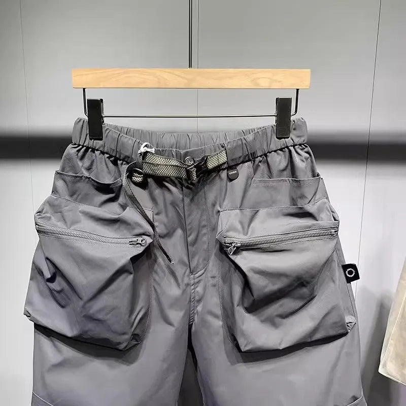 Men's large size work shorts in black with elastic waist and pockets