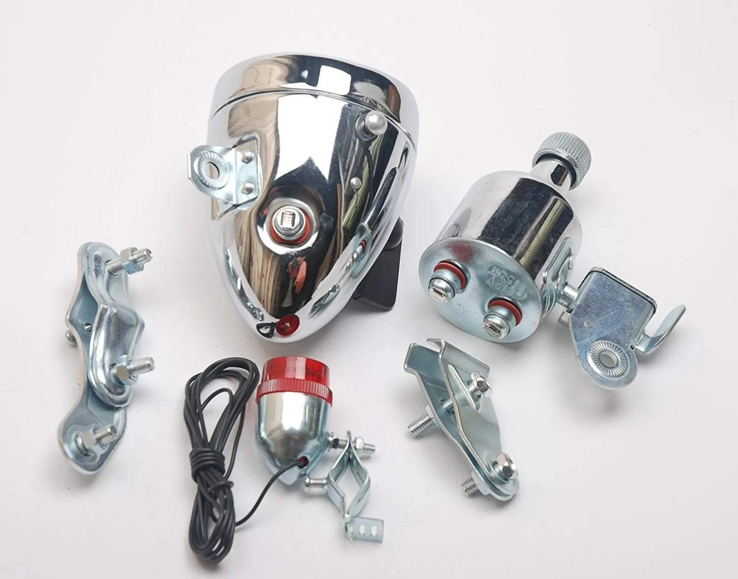 Silver bicycle dynamo generator light modification kit showing mounting bracket and wiring connections