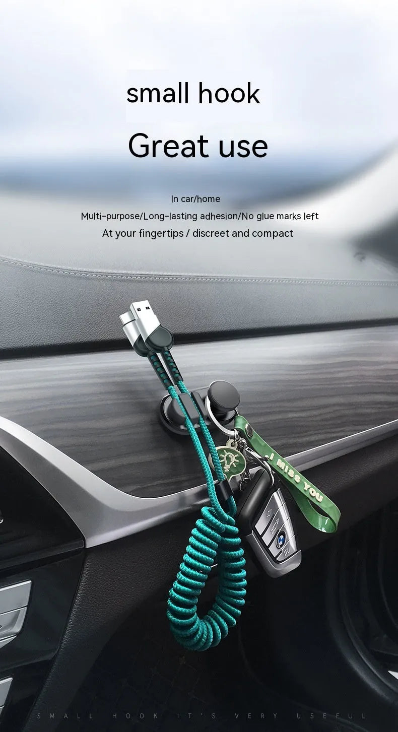 ABS silicone adhesive hook for car data cable storage in dark green, silver, or black.