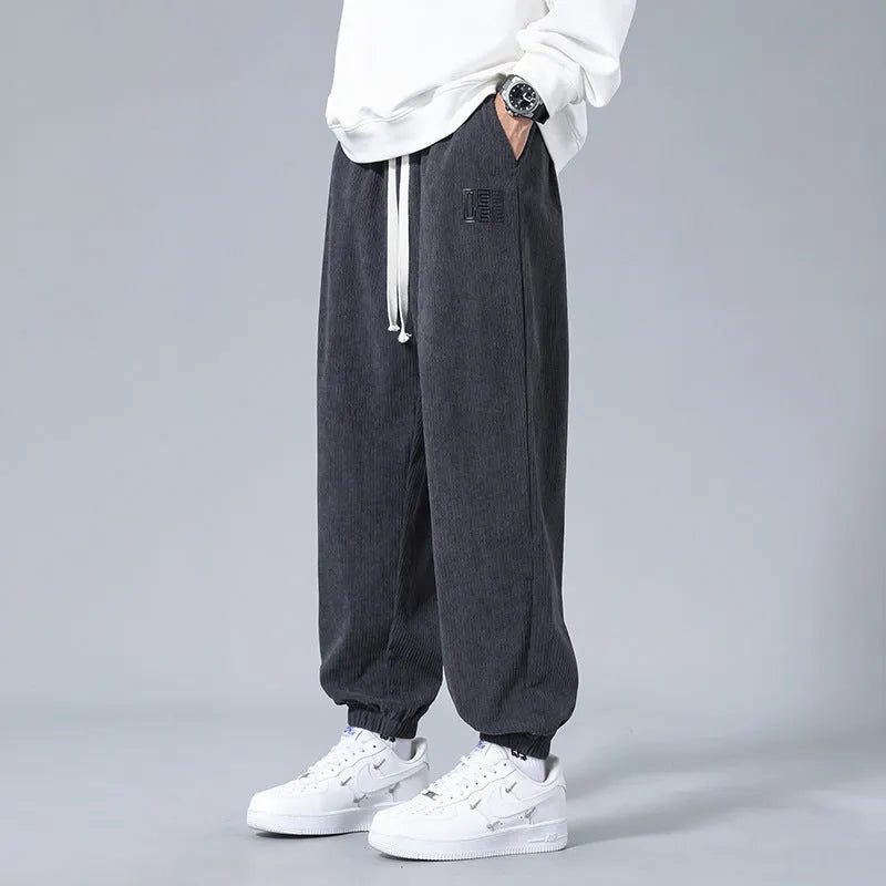 Men's workwear casual sports trousers in dark gray with letter print, polyester fibre, side view