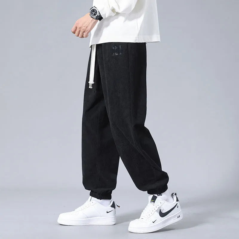 Men's workwear casual sports trousers in dark gray with letter print, polyester fibre, side view
