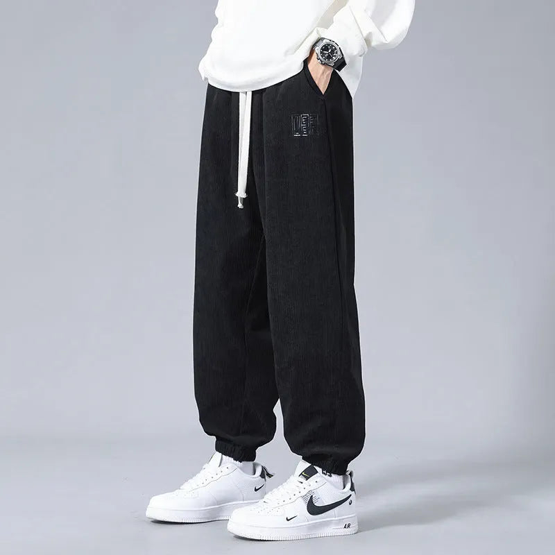 Men's workwear casual sports trousers in dark gray with letter print, polyester fibre, side view