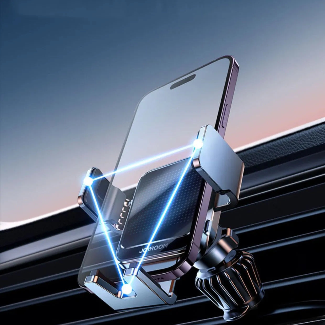 Black automatic wireless car charging bracket mounted on a car air vent, showing a phone placed on the charger.