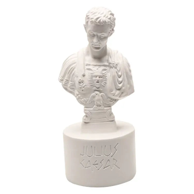 White synthetic resin American creative character model pen holder on a desk.