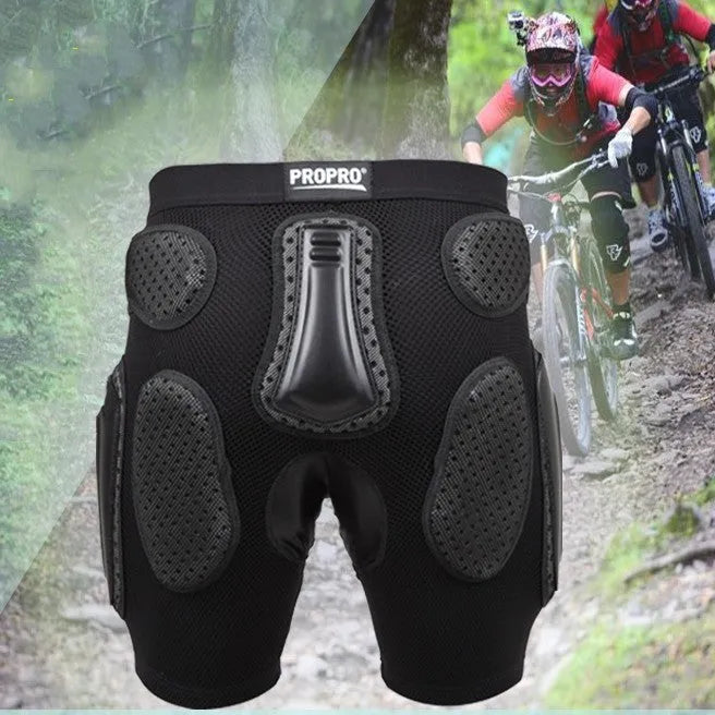 Black cycling hip protection pants showing integrated hip pad, displayed flat.