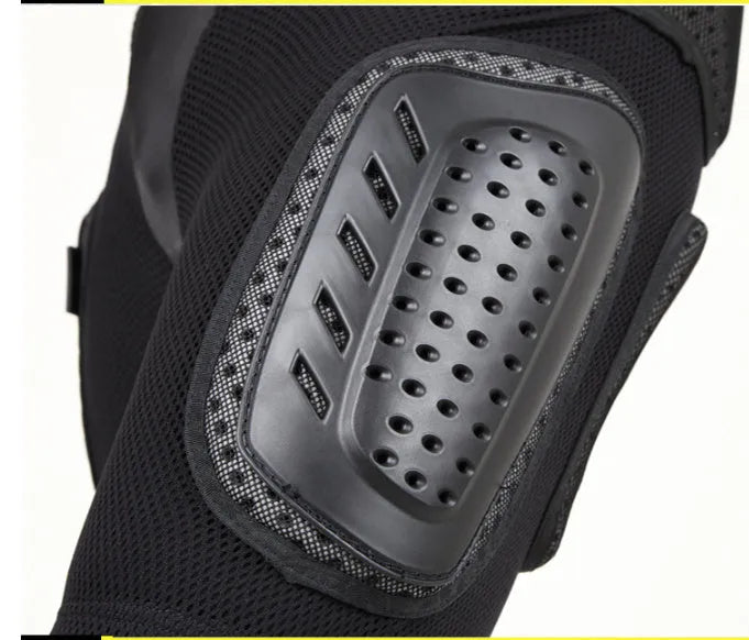 Black cycling hip protection pants showing integrated hip pad, displayed flat.