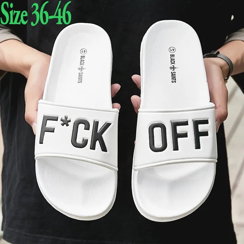 Men's black open-toe slippers with a soft viscose upper and textured rubber sole.