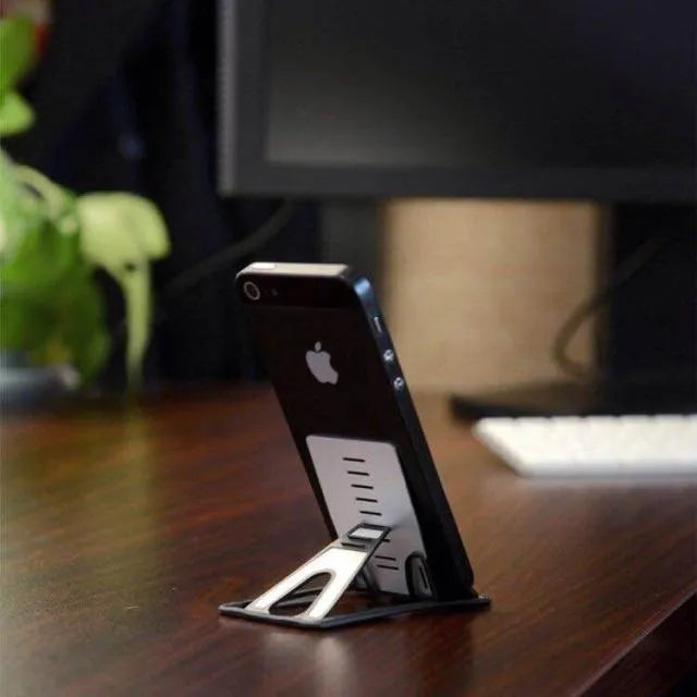 Black lazy bracket card phone holder for desktop measuring 8.5cm by 5cm