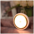 Round white motion sensor LED light unit, 80mm in diameter, for wardrobes and corridors.