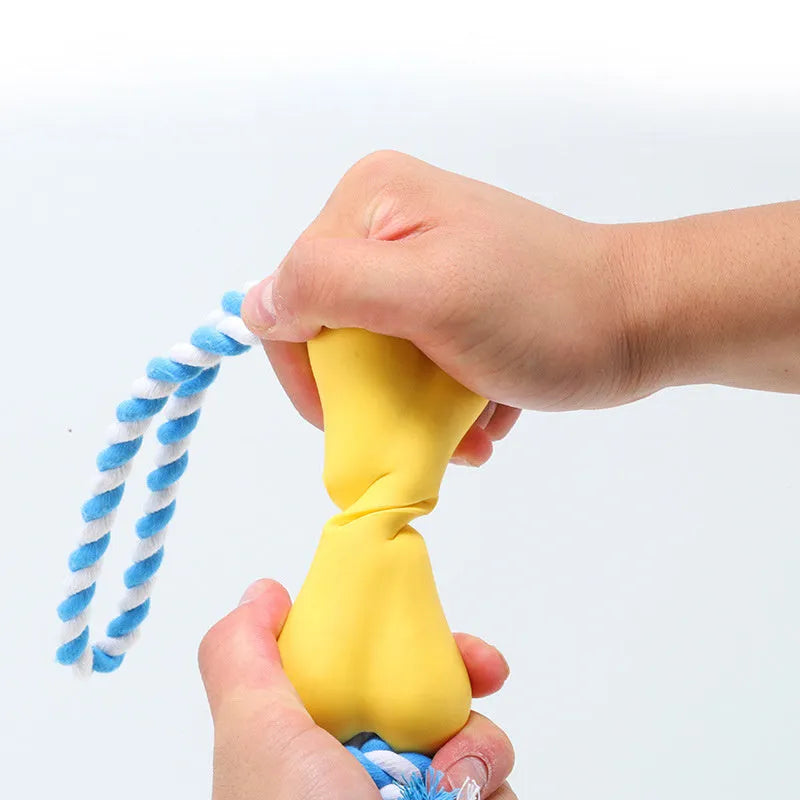 Green porous rope bone dog chew toy with knotted texture for treat stuffing and teeth relief