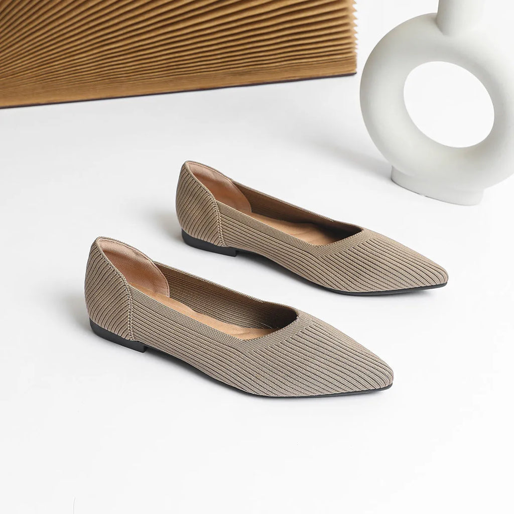 Women's knit flat pumps with pointed toe and rubber sole available in multiple colours