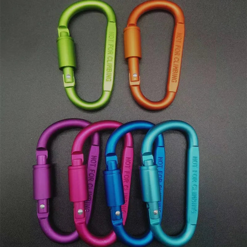 Aluminium D-shaped carabiner with lock in multiple colour options on a grey background.