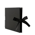 DIY handmade photo album with coil binding in portrait orientation