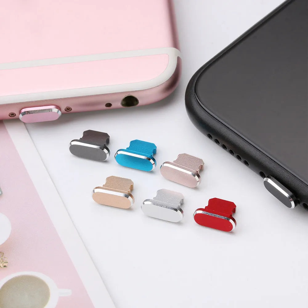 Aluminium alloy dust plug for iPhone charging port in various colours including gold and black.
