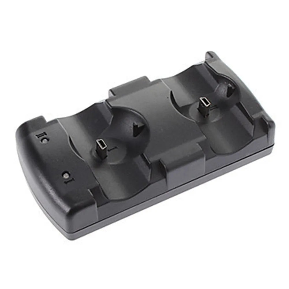 Black PlayStation 3 dual controller charging dock with USB cable on a white background.