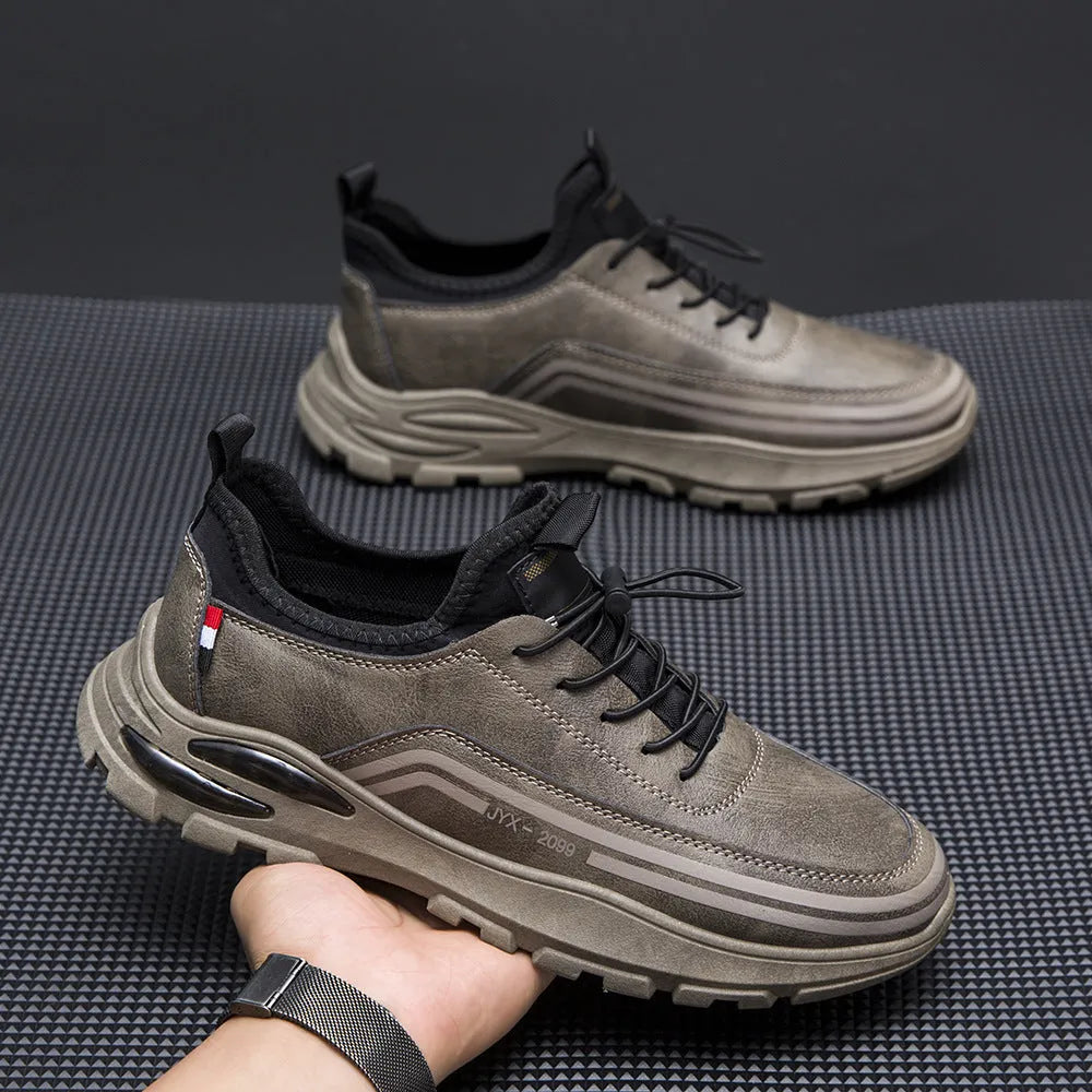 Men's black fleece-lined waterproof sneakers with a round toe and low-top design on a rubber sole.