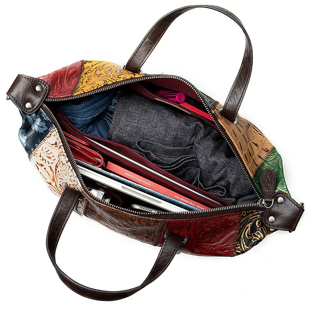 Cowhide leather women's handbag in multi-colour, 36cm long with zip closure and shoulder straps.