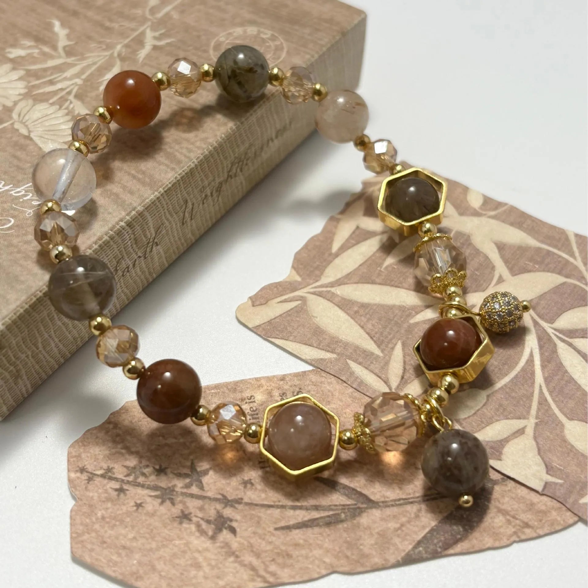 Gold colour citrine crystal bracelet with 8mm beads featuring Chinese auspicious symbols including Ruyi and Fu character