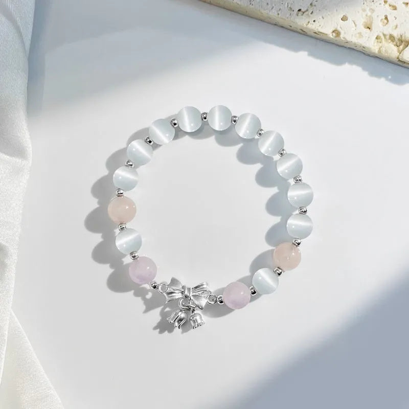 Lavender purple bowknot crystal bracelet with opal elements measuring 10mm