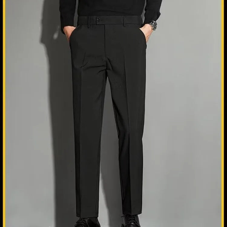 Men's straight-leg ankle-length suit trousers in apricot colour showing business gentleman styling with lightweight draping effect