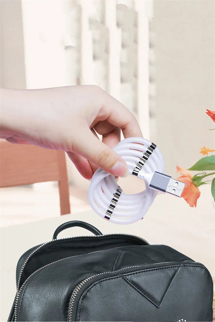 Black magnetic charging cable with aluminium connectors compatible with Apple iPhone and Android devices
