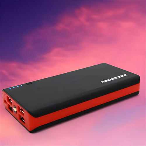 Red 20000mAh portable power bank showing size relative to a hand, with USB port visible.