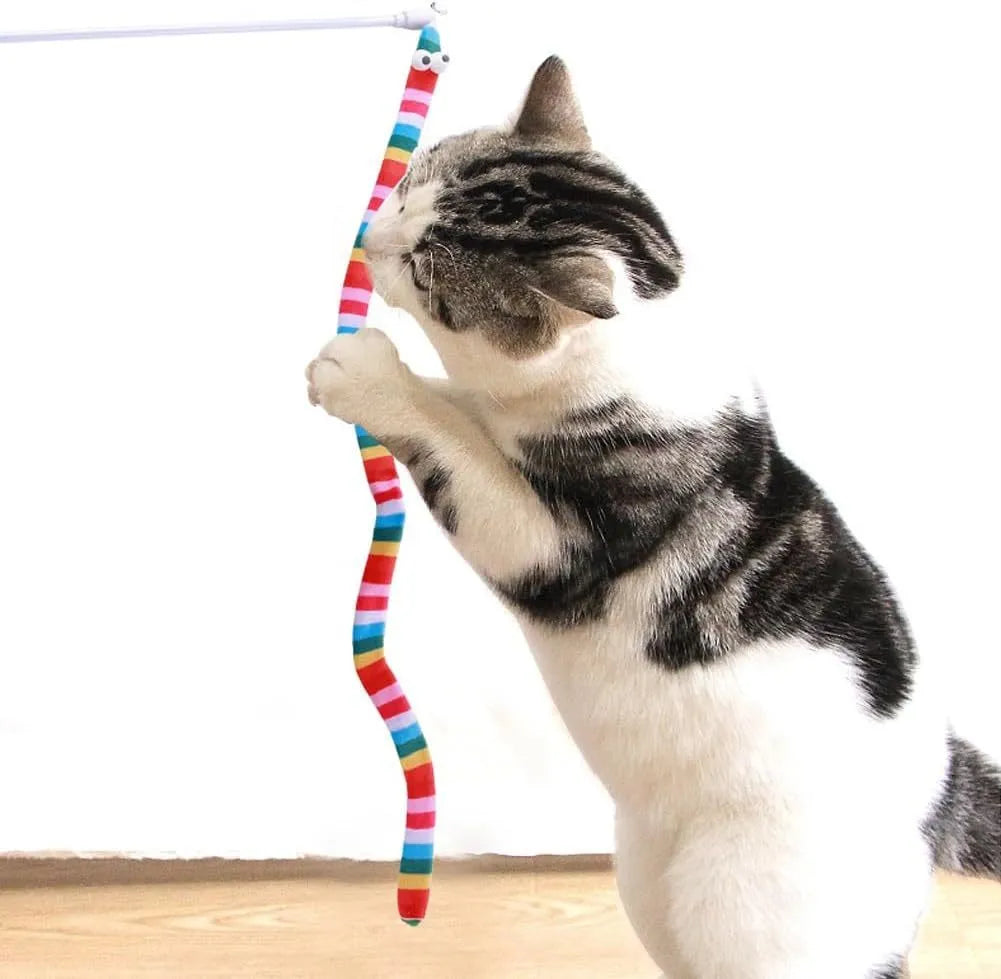 Cat wand toy with polycarbonate handle and long plush strip in vibrant colours, shown with bell attachment.