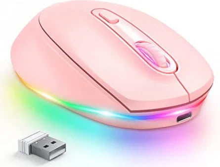 Light grey wireless ergonomic mouse with USB charging cable on a wooden desk.