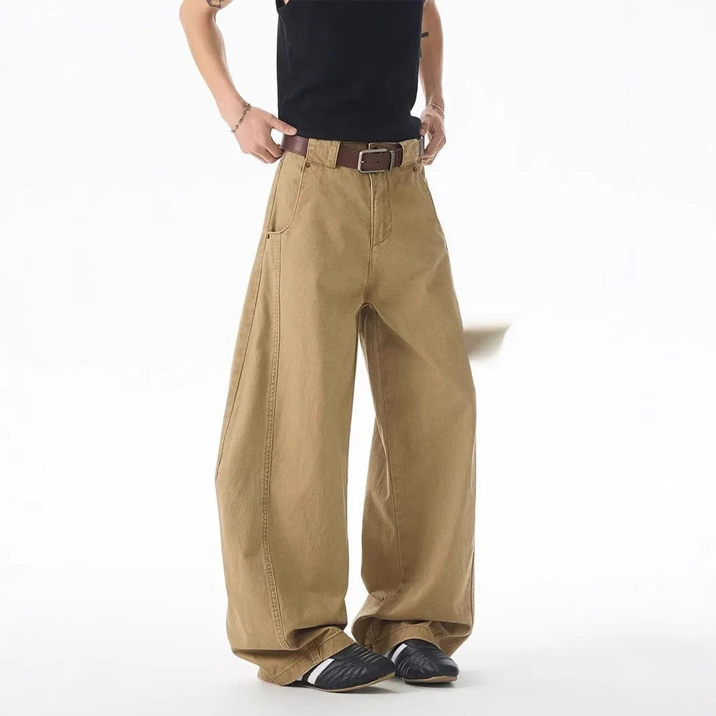 Brown men's casual jeans with loose straight leg fit and button-fly front closure