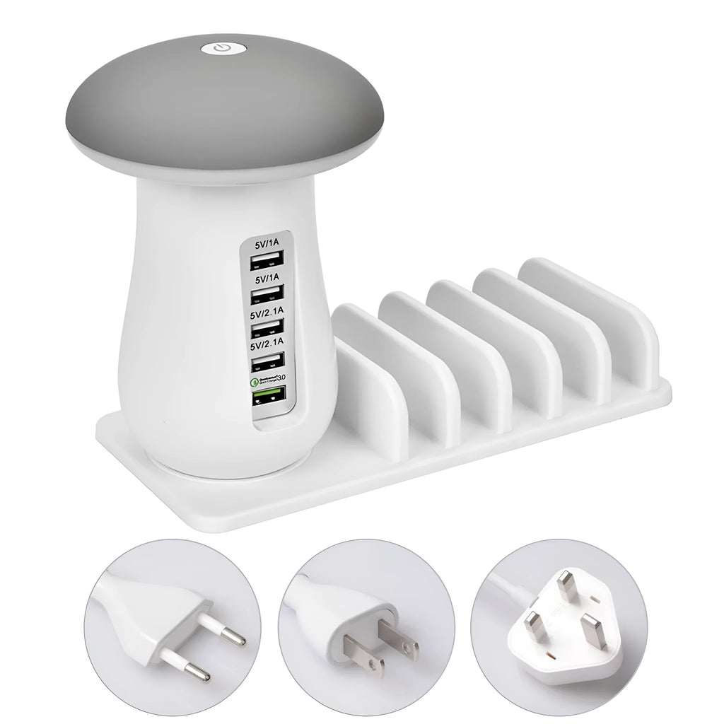 White glossy mushroom-shaped LED desk lamp with a built-in 5-port USB charging station for smartphones and tablets.