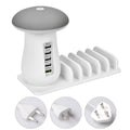 White glossy mushroom-shaped LED desk lamp with a built-in 5-port USB charging station for smartphones and tablets.