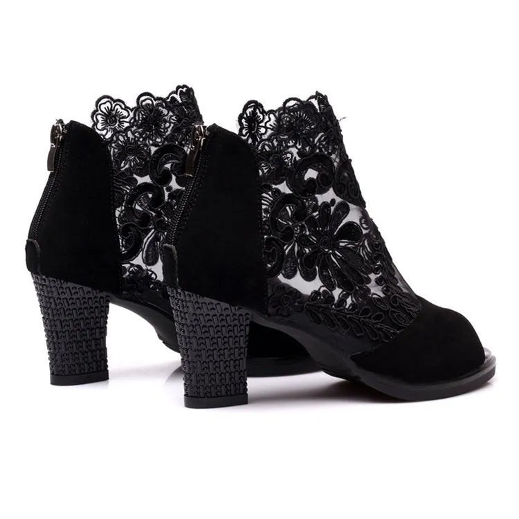 Black lace gladiator sandals for women with a square high heel, peep toe, and a zip closure.
