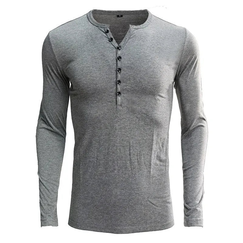 Men's solid colour cotton blend henley shirt with long sleeves and buttoned placket.