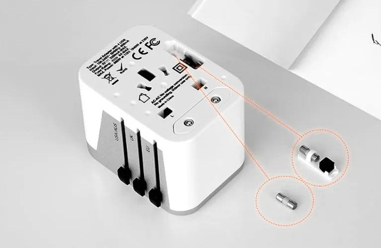 Universal travel adapter 8A 2000W in black, compact 54x68x51mm for over 180 countries