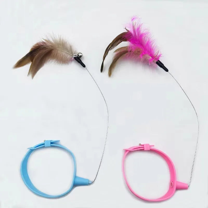 Blue adjustable cat collar with attached feather wand toy and small bell