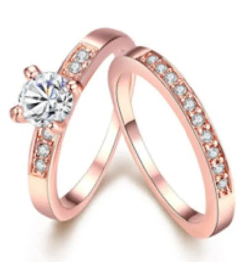 Rose gold ring with diamonds on a copper band, available in US sizes 5 to 12