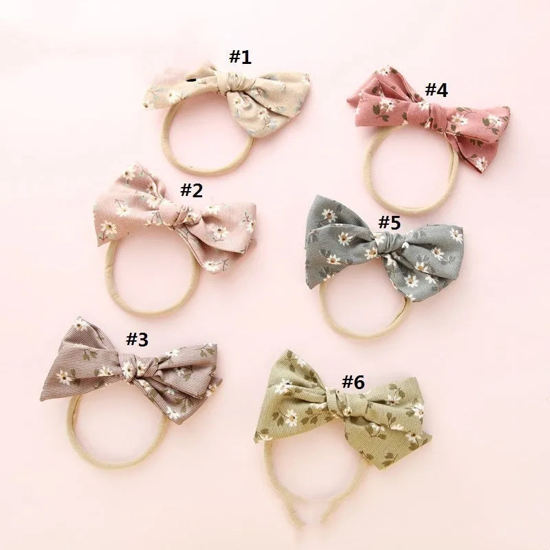 Children's knotted bow hair ring made of cloth in a Princess series Snow White design.