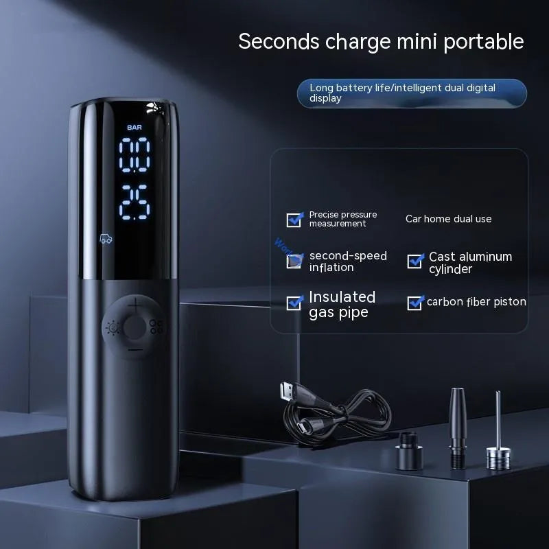 Black portable electric car air pump with tyre pressure gauge and plug connection